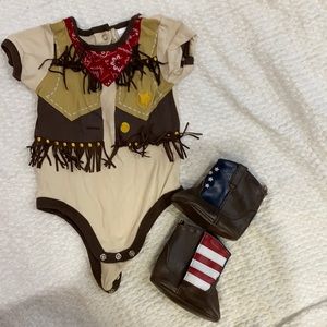 Cowboy onesie and boots.